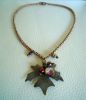 Collier pendentif feuille cuivrée