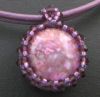 Pendentif  Arena Violet sur double cordon cuir