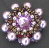 bague en perles nacrées, toupies et cabochon swarovski