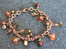 Bracelet cha&icirc;ne R&eacute;my Dis et breloques