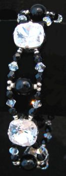 Bracelet fantaisie noir et doré rose Festive