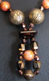Collier &agrave; la boucle Laiton & bronze