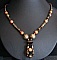 Collier &agrave; la boucle Laiton & bronze