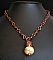Collier cuir sur cha&icirc;ne et pendentif c&eacute;ramique &eacute;cru