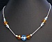 Collier fine cha&icirc;ne et rondes Swarovski