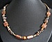 Collier Murano aux carr&eacute;s cuivr&eacute;s