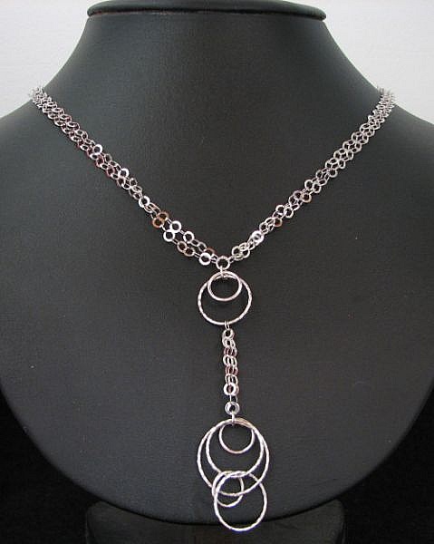 Collier pendentif d'anneaux en argent