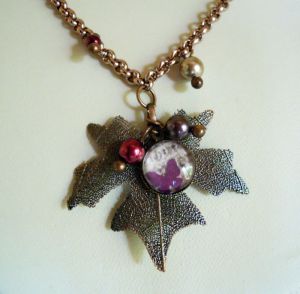 Collier pendentif feuille cuivrée