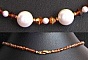 Collier Saturne ambre