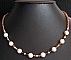 Collier Saturne ambre