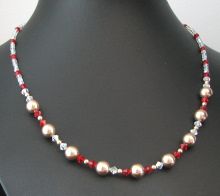 Collier Saturne rouge