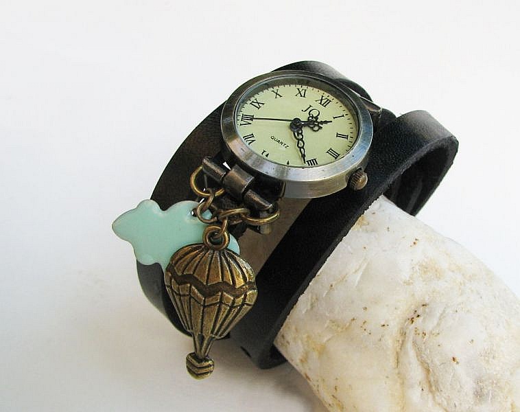 Montre &eacute;vasion bracelet en cuir au choix