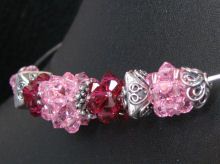 Torques aux boules de perles roses et Bali
